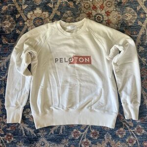 Peloton off white thick crewneck embroidered sweatshirt. Size medium.